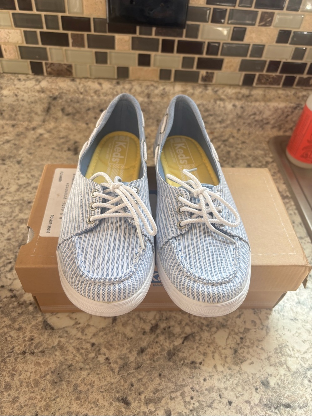 Keds lace up boat style shoe